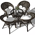 Wicker Dining Set with Table and Four Chairs Featuring White Cushions 3d model