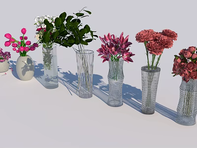 Assorted Glass Vases with Colorful Flowers and Green Leaves Arrangement 3d model