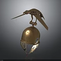 Ancient Golden Weapon Helmet Featuring Intricate Bird Shaped Ornament And Historical Design
