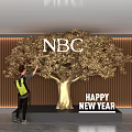 Popular Photo Spot with Golden Tree NBC Logo and Happy New Year Decorations