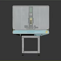 Industrial Equipment With Transparent Protective Enclosure On Blue Platform And White Stand