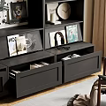 Black Modern Bookcase Interior With Books Decorative Items Photo Frames Magazines And Clock