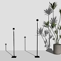 Modern Floor Lamp With Circular Orange Red Light Projection Against Gray Wall And Potted Plant