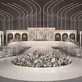 Modern Banquet Hall With Curved Lighting Decorative Stage And Floral Arrangements