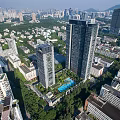 Modern High Rise Buildings With Glass Facades And Balcony Designs In Urban Skyline
