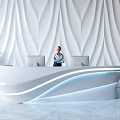 Modern White Reception Desk With LED Lighting And Wavy Wall Background And Potted Plant