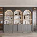 Modern Gray Bookcase With Arched Design Glass Doors And Decor Items On Illuminated Shelves