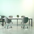 Modern Gray Wheeled Leisure Chairs In Office Interior With Table And Plants