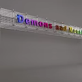 Art Installation with Metal Grid Structure Featuring Colorful Letters Displaying Demons and Monsters Text