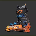 Black and Orange Ski Boots With Blue Laces Adjustable Straps and Sturdy Soles for Skiing