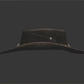 Gray Leather Cowboy Hat with Decorative Studded Leather Band Displayed on Black Background with Reflection