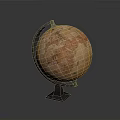 Orange Globe With Detailed World Map On Black Metal Stand Square Base