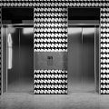 Elevator Lobby With Golden Framed Elevators And Black White Houndstooth Tile Walls Gray Floor 3d model