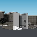 Modern Museum Building With Glass Facade White Walls And Geometric Design Surrounded By Trees