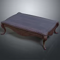 Dark Wooden Coffee Table With Carved Details And Curved Legs In Traditional Style