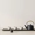 Minimalist Tea Set With Black Teapot White Teacups On Wooden Tray