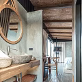 Hotel Room Interior With Wooden Ceiling Large Windows Gray Walls Bed And Bean Bag Sofa