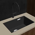 Modern Black Kitchen Sink with Sleek Faucet on Light Countertop and Wooden Cabinets