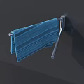 Blue Striped Towel Hanging On Metal Towel Rack Against Dark Wall