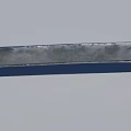 Intricate Decorative Sword With Golden Spiral Patterns And Red Sheath