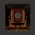 Vintage Folding Camera With Wooden Body Metal Parts And Leather Bellows