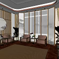 Hotel Public Lounge Area With Bamboo Paneling Round Ink Paintings Wooden Flooring And Brown Sofas