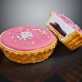 Pink Frosted Tart With Colorful Sprinkles Purple Filling White Cream And Crunchy Shell