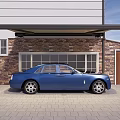 Blue Luxury Car Parked In Front Of Stone Wall Building With Windows And Wooden Door