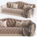 Elegant Sectional Sofa With Tufted Design Beige Color Pillows And Throw Blanket