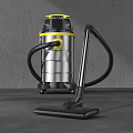 Silver Cylindrical Vacuum Cleaner With Black Hose Yellow Accents And Floor Nozzle