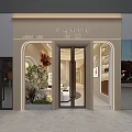 YANFU Storefront Facade Featuring Arched Design Glass Doors Decorative Plants Lighting And Display Windows