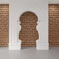 White Ornate Arched Doorway With Carved Pillars Against Red Brick Wall
