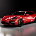 Red Luxury Sports Car with Aerodynamic Design Black Wheels on Shiny Reflective Floor