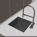 Modern Black Vegetable Sink In Kitchen With Sleek Faucet And White Countertop