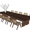 Long Wooden Dining Table Set with Matching Chairs and Vase with Twigs