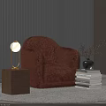 Elegant Table Lamp with Golden Stand on Wooden Base and Brown Furry Chair Near Books