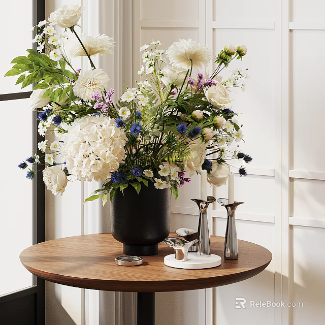 Black Vase With White And Blue Flowers Foliage On Round Wooden Table With Silver Candleholders 3d model 