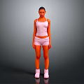 A Woman Standing in White Tank Top Shorts and White Boots Against Gray Background