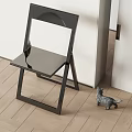 Stylish Modern Leisure Chair With Black Metal Frame And Smooth Seat On Wooden Floor Interior
