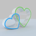 Heart Shaped Cookie Cutters With Blue And Green Edges On Light Background
