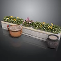 Long Stone Flower Planter With Mixed Colorful Flowers And Decorative Clay Urns