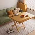 Wooden Foldable Table In Living Room With Green Sofa Coffee Cup Book And Fruits