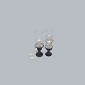 Decorative Ornament Set With Glass Candle Holders Black Bases And White Candles