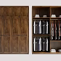 Carved Wooden Wardrobe With Open Interior Hanging Clothes And Folded Shelves