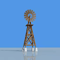 Wooden Windmill Structure With Metal Blades And White Base Against Blue Sky