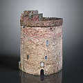 Ancient Round Stone Brick Tower With Ruined Top Small Windows And Doorway
