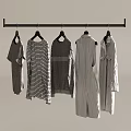 Row of Clothes Hanging on Hangers with Various Styles Striped Patterns and Gray White Tones