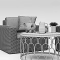 Outdoor Wicker Sofa With Green Beige Cushions Metal Coffee Table Teapot Lemonade And Plant