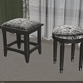 Two Black Stools With Patterned Fabric Seats In Room With Curtains And Carpet