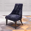 Navy Blue Plush Accent Chair With Tufted Buttons And Dark Wooden Legs On Geometric Rug